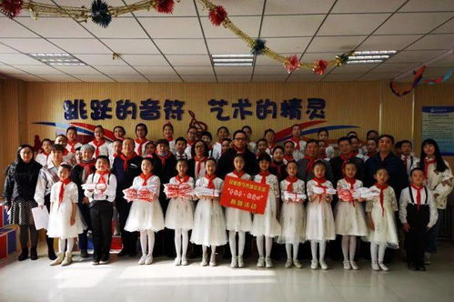 博爱牵手 温暖同行 沈家寨小学小土豆农民工子女合唱团收获爱心礼物